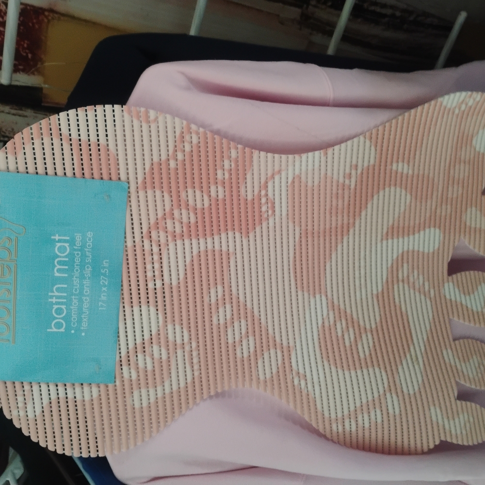 NWT pink non slip footprint bath mat.